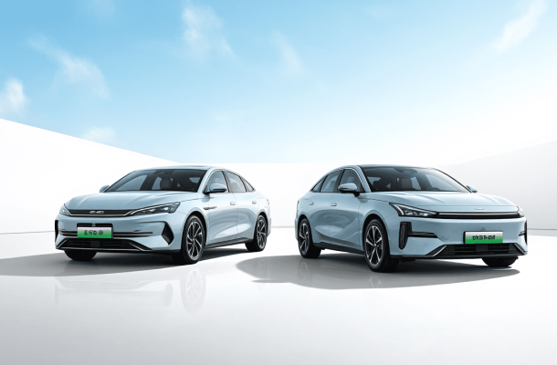 Two light - blue electric cars.