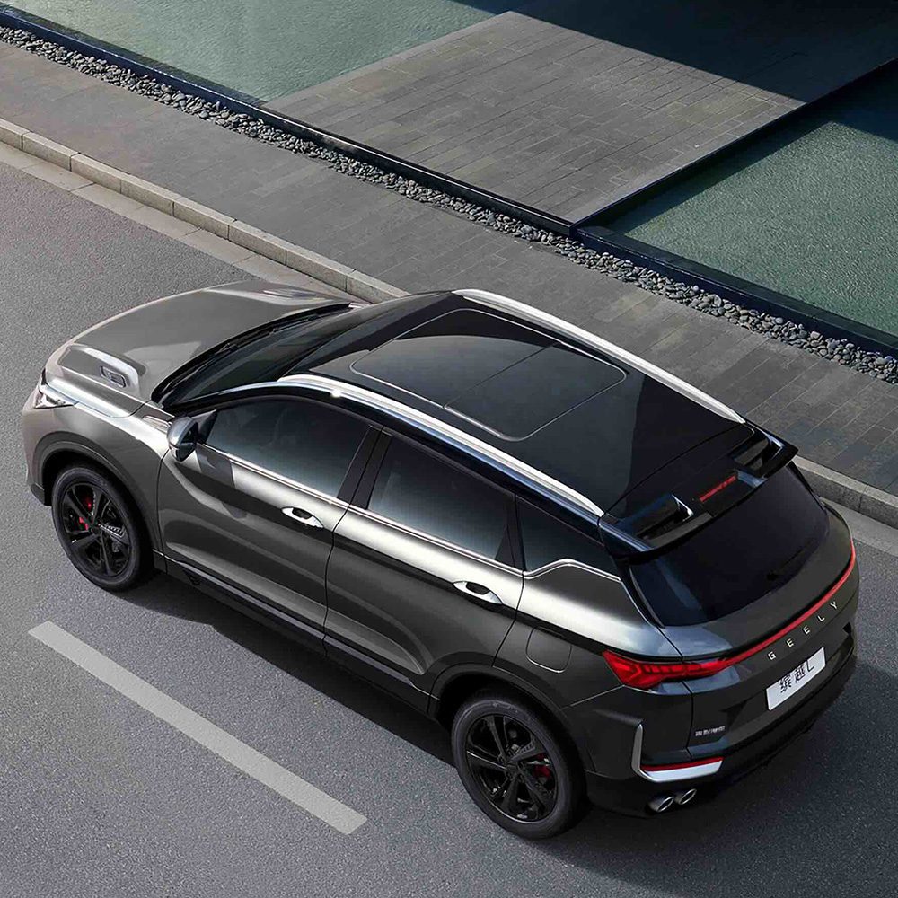 Geely Binyue L 2025 1.5TD DCT Star Glory Edition top view Aerial view of a gray Geely Boyue L SUV parked on a street.