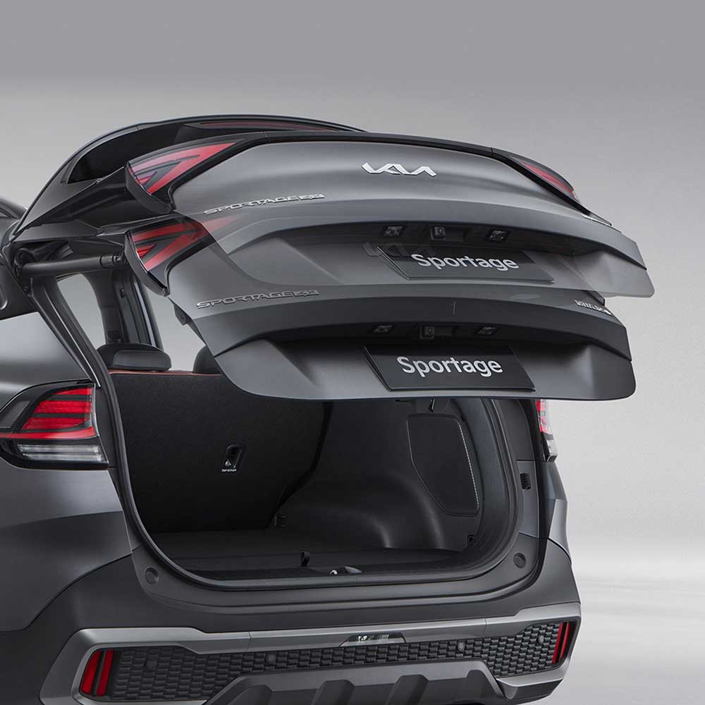 KIA Sportage 2025 1.5T 2WD Premium Intelligent Edition electric tailgate The rear view of a Kia Sportage with its trunk open, showing the spacious cargo area.