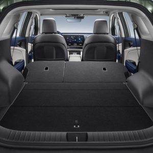 KIA Sportage 2025 1.5T 2WD Premium Intelligent Edition trunk The open trunk of a car, showing a spacious cargo area with folded rear seats.