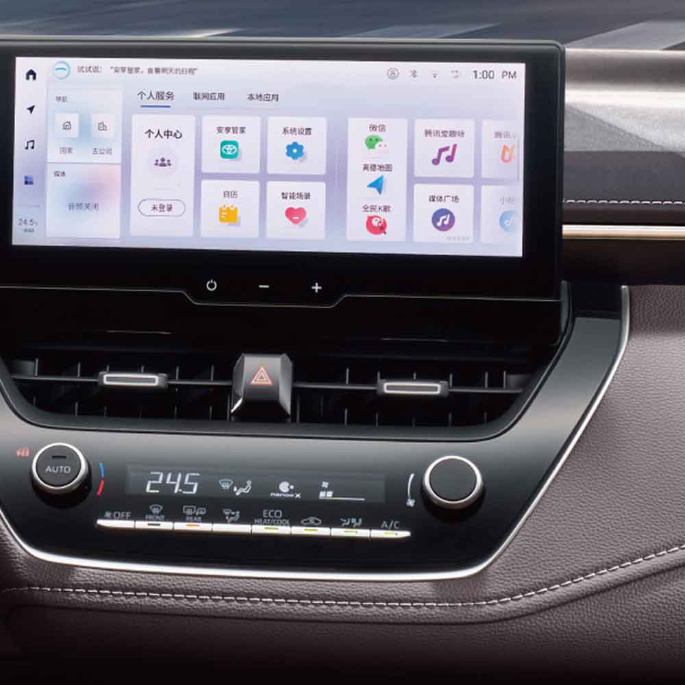 Toyota Corolla 2024 1.2T Elite 10.25-inch multimedia intelligent online navigation system Interior of a car showing the infotainment screen with various apps and the climate control panel.