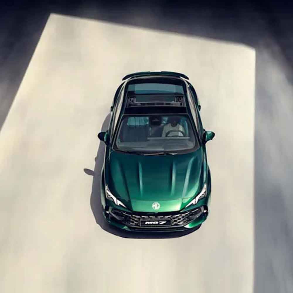 A top - down view of a green MG7 car with a sunroof, showcasing its sleek design.