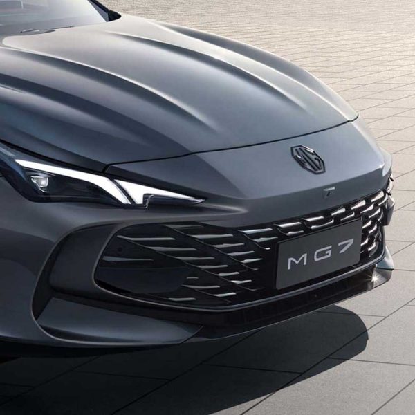 Close - up of the front of a gray MG7 car, showcasing its grille, headlights, and the "MG7" badge.