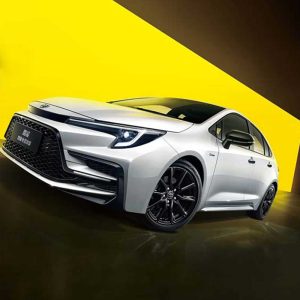 White sedan with a yellow background.