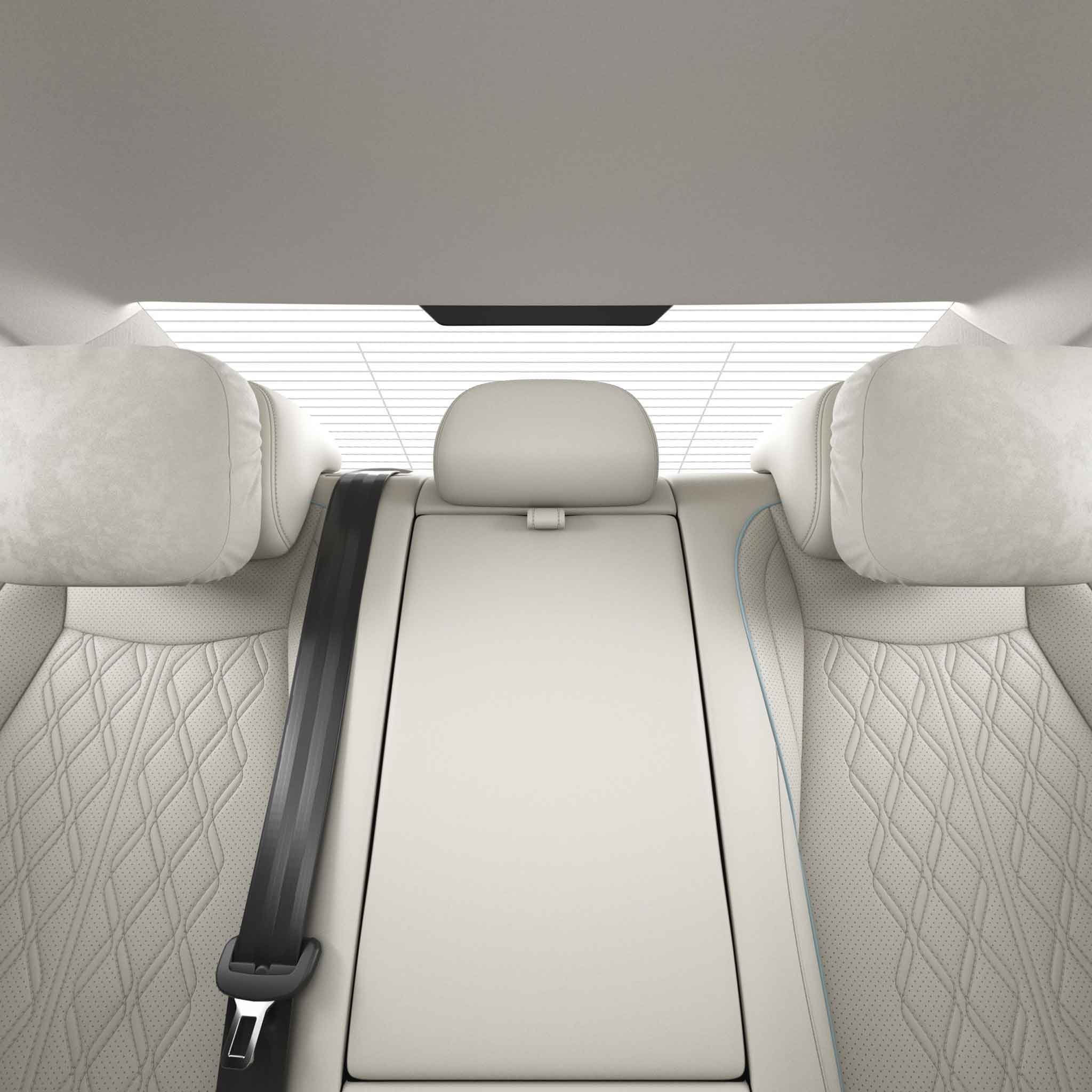 Rear seat area of a car with white leather upholstery and a sunroof.