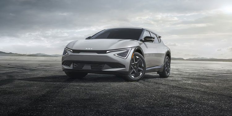 2025 Kia EV6, three quarter front view, highlighting its sleek headlights