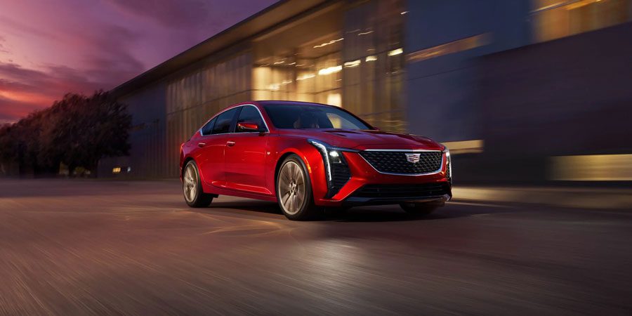 2025 Cadillac CT5 Side-front view while driving at high speed