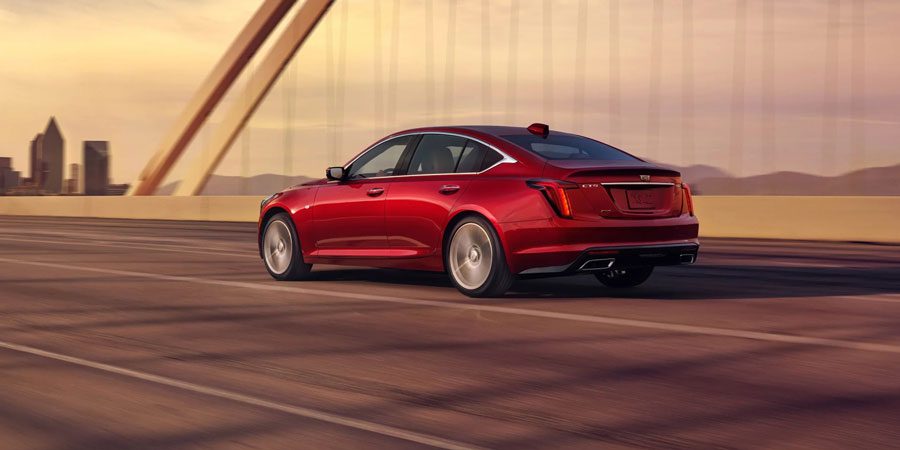 2025 Cadillac CT5, rear-side view while driving at high speed