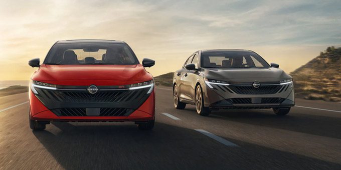 2026 Nissan Sentra view 2 sentras driving side by side road sunset behind them