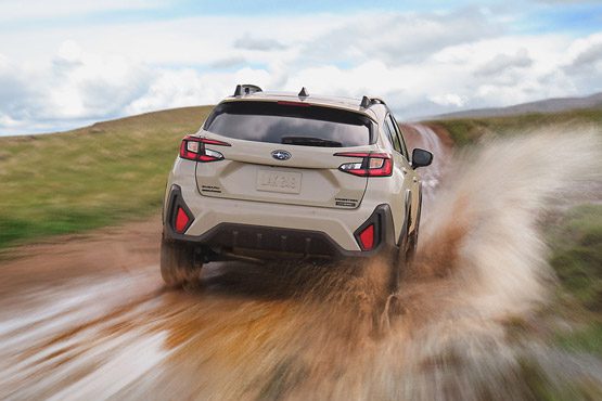 2026 Subaru Crosstrek Limited Hybrid shown in Sand Dune Pearl