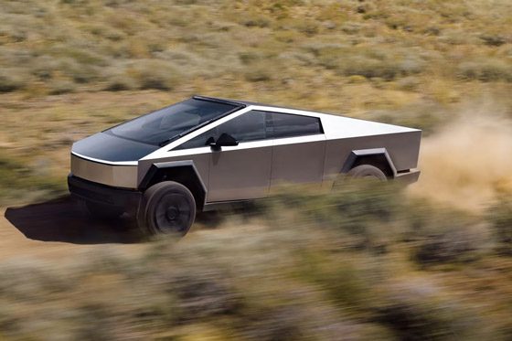 Tesla Cybertruck driving at high speed