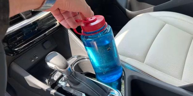 The car cup holder is too small to fit a water bottle