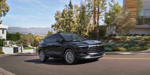 A Black 2026 Chevy Blazer Parked Next to a Building