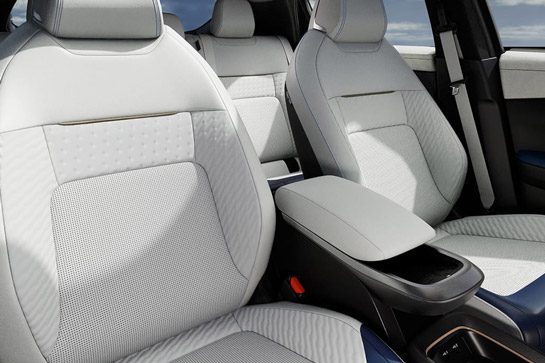 2026 Nissan LEAF interior angled view of zero gravity front and rear seats