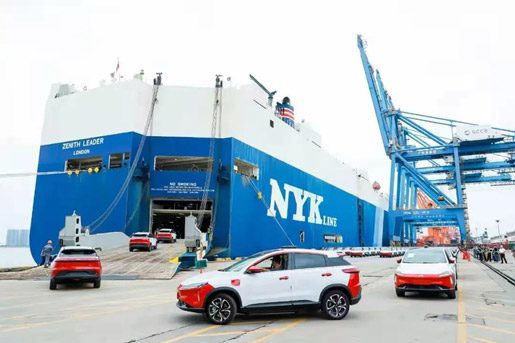 Cars being loaded onto a roll-onroll-off ship