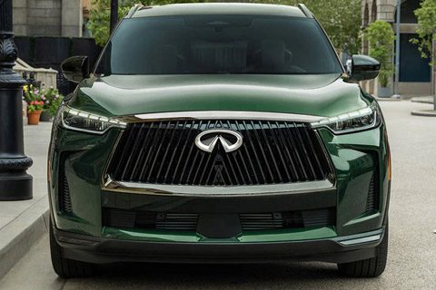 Front exterior view of 2026 INFINITI QX60 highlighting bold grille design