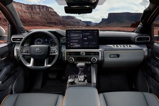 2026 Toyota Tacoma Trailhunter interior shown in Mineral SofTex trim