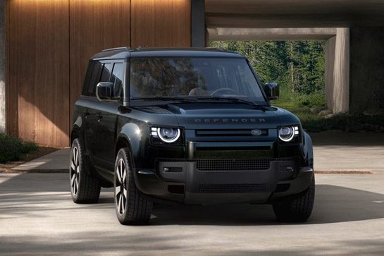 A Blue Defender parked