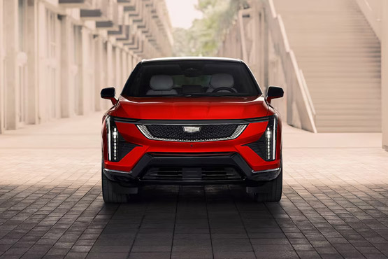 A Front View of a Red 2026 Cadillac OPTIQ