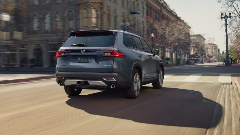 Rear three-quarter view of the 2026 Toyota Grand Highlander Hybrid MAX Platinum model