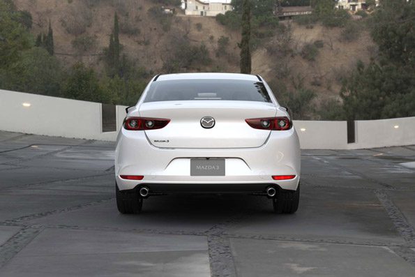 Rear view of a white 2026 Mazda 3