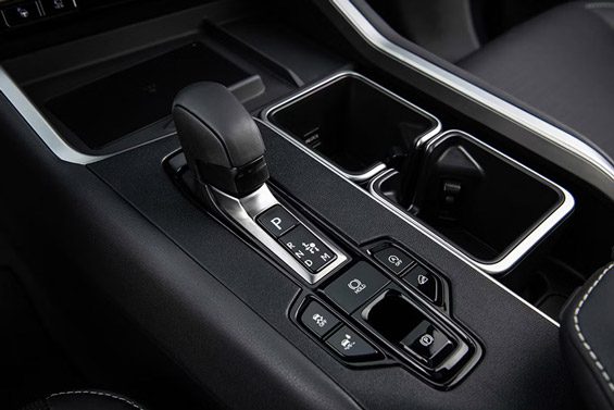 The 2026 Lexus TX 350 features traction control buttons and off-road mode on the center console