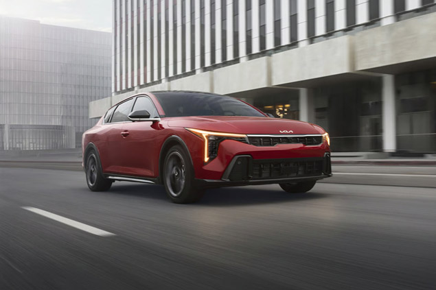 Dynamic View of the 2026 Kia K4 Sedan in Red