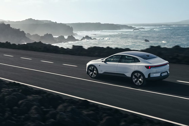 Rear three-quarter view of a 2026 Polestar traveling at high speed