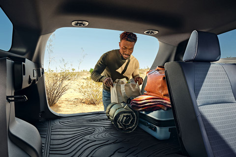 The 2026 Subaru Trailseeker's luggage compartment space after folding down one side of the rear seats